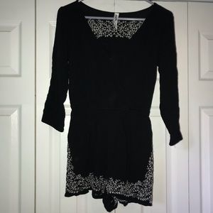 Black and floral romper